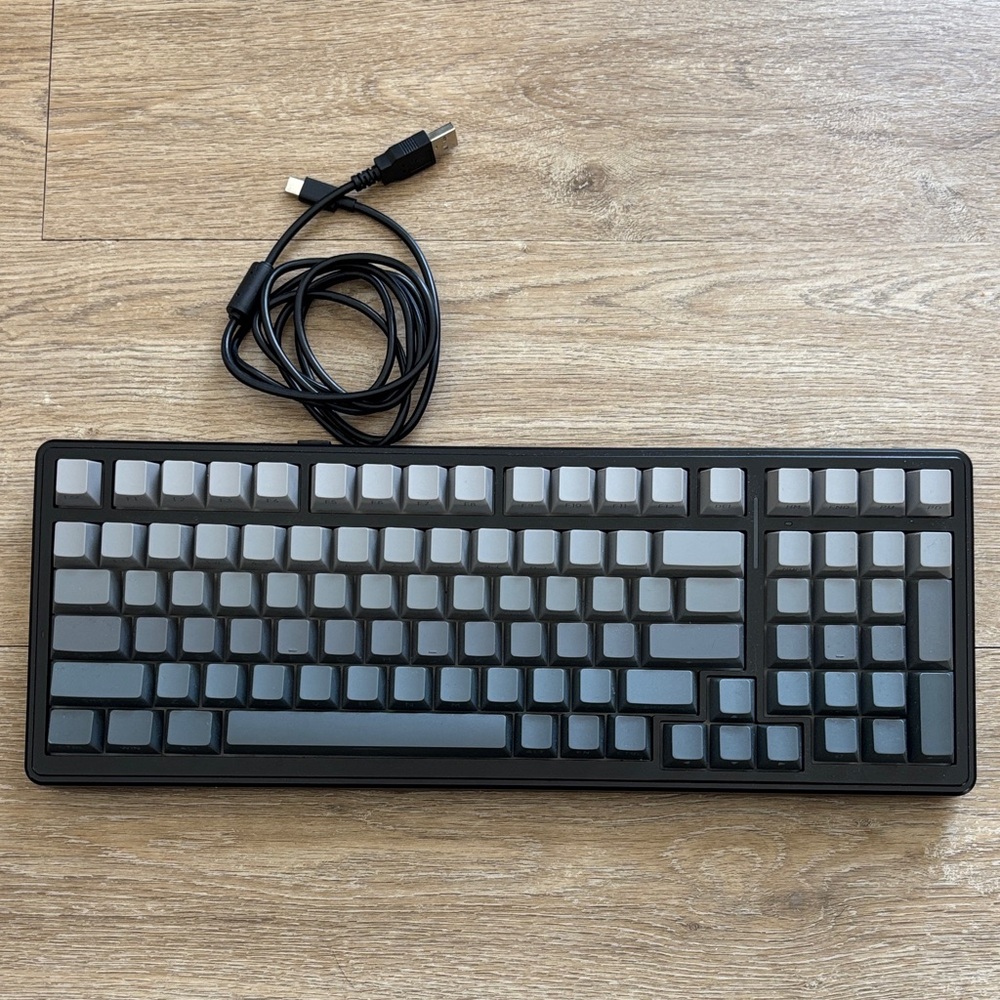 Black and Gray Wireless Keyboard w/charging chord